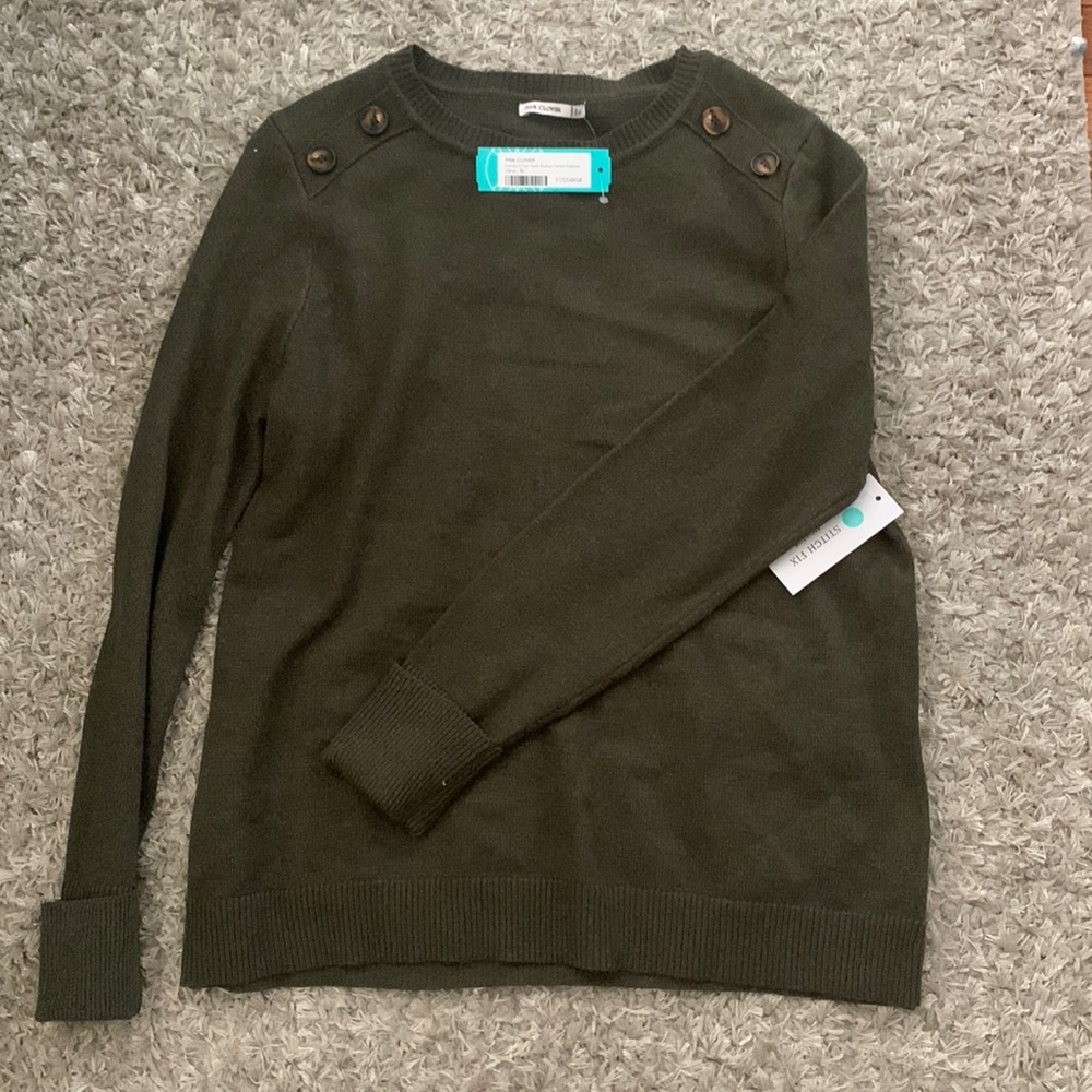 Never worn sweater. New with tags